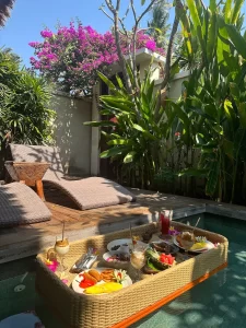 Floating breakfast served in a private pool at Aishwarya Villa.