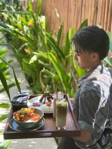 Staff serving tropical food and drinks at a villa in Gili Trawangan.