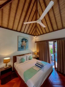 Private villa bedroom with pool access at Pera ONE Villas Gili Trawangan