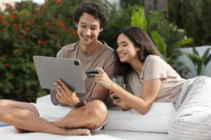 Couple planning a Gili Trawangan travel budget on a private villa terrace